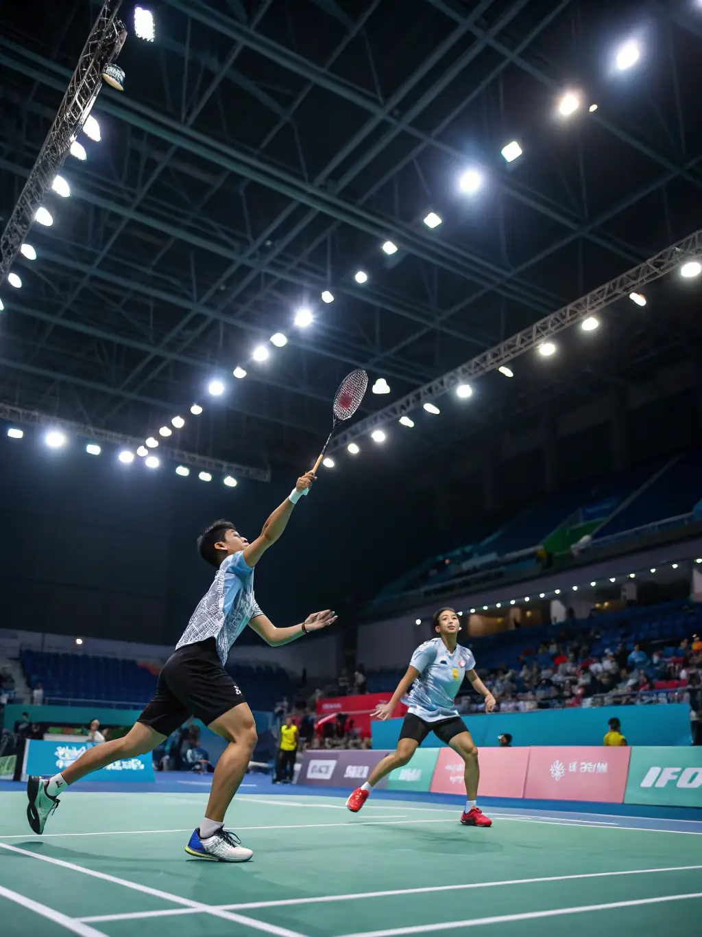 A photograph of a badminton tournament, capturing the intensity and excitement of competitive play among adult participants.
